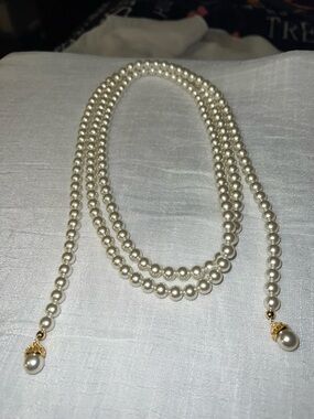 Lustrous Cream Pearl Rope Necklace with Gold Accents
